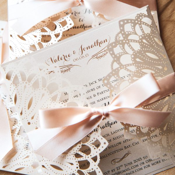 Rustic elegant laser cut champagne invitation with satin