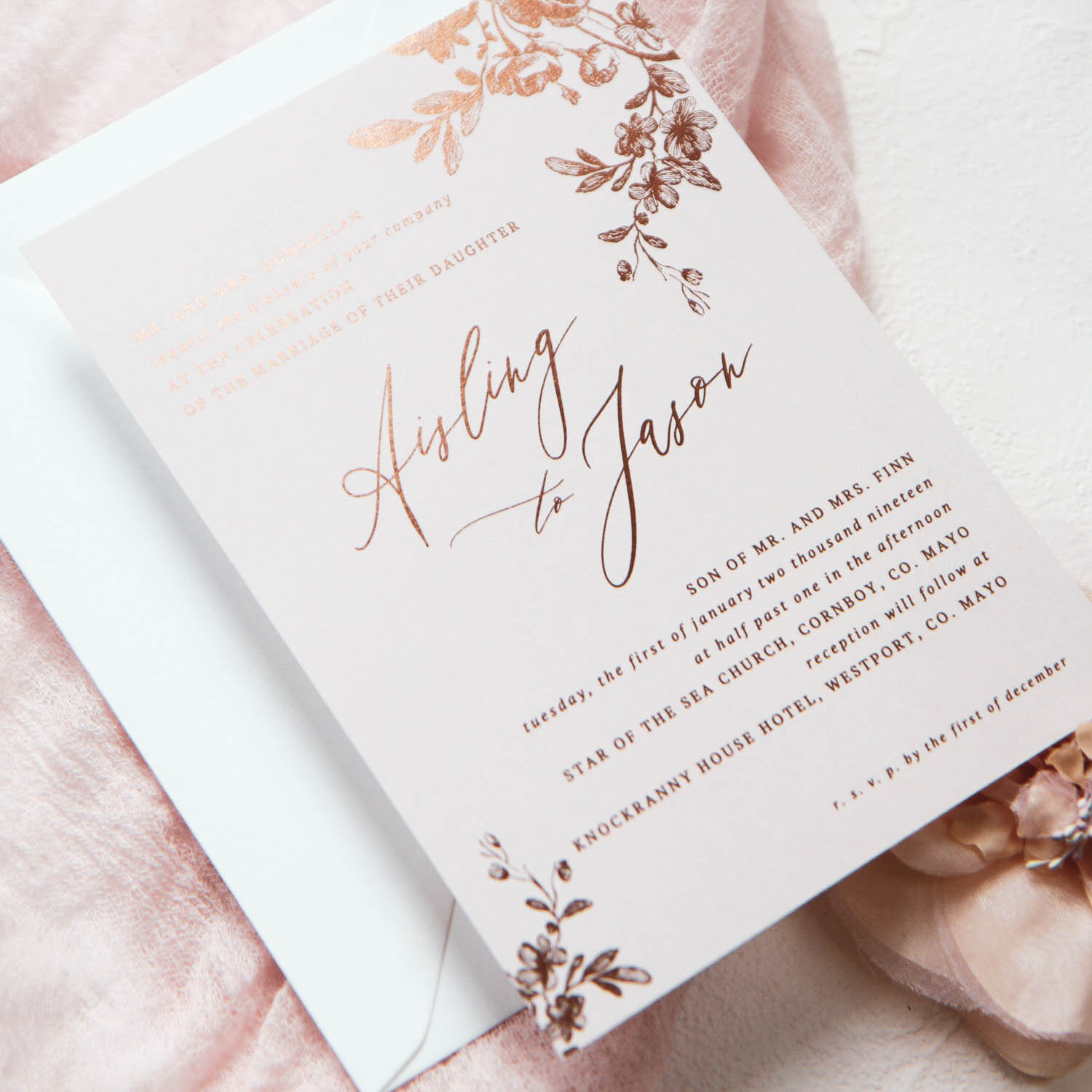Blush invitation with floral rose gold foil print